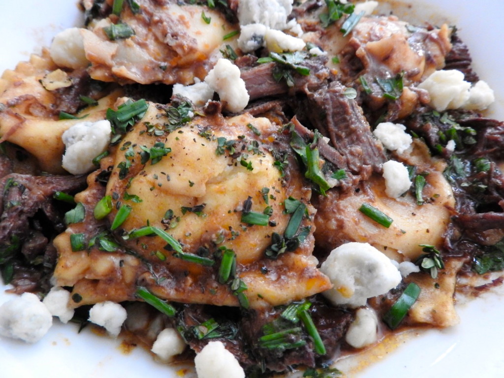 Gorgonzola Polenta filled ravioli with short rib wine demi-glace