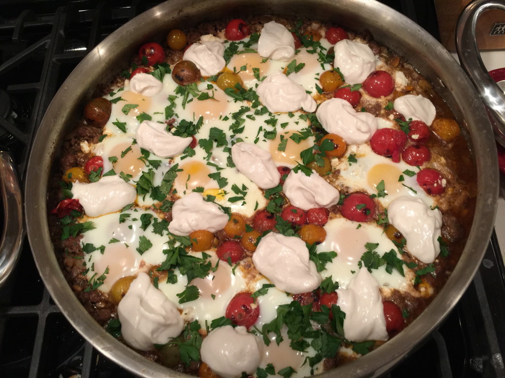 Lamb With Blistered Tomatoes, Braised Eggs, and Tahini