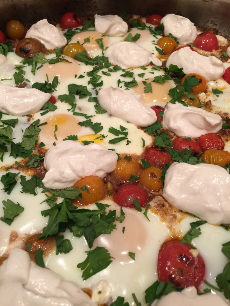 Lamb With Blistered Tomatoes, Braised Eggs, and Tahini